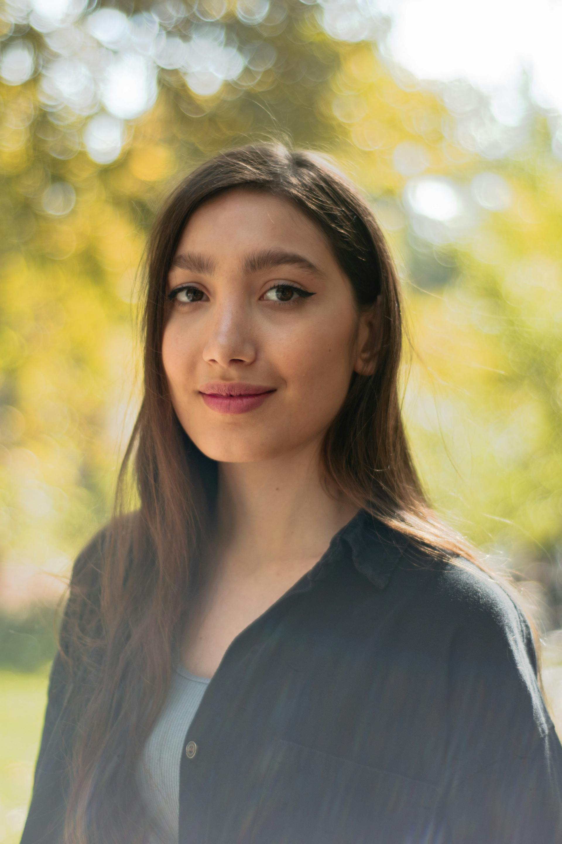 Una mujer sonriente | Fuente: Pexels