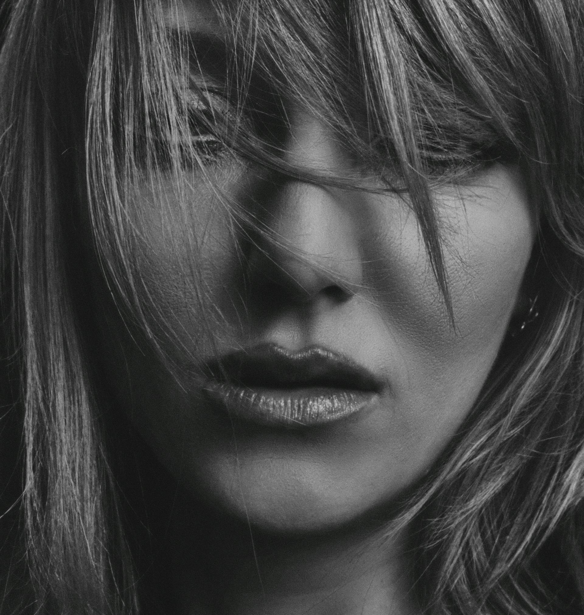Foto en escala de grises del rostro de una mujer | Fuente: Pexels