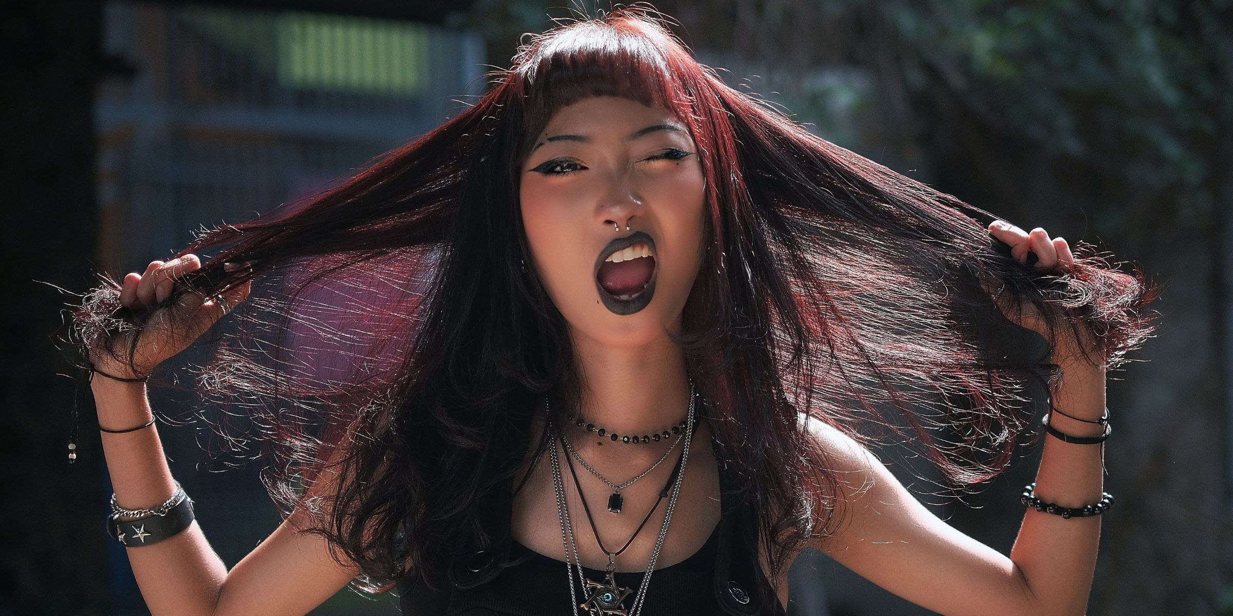 A close-up of a woman dressed in emo-fashion | Source: Pexels