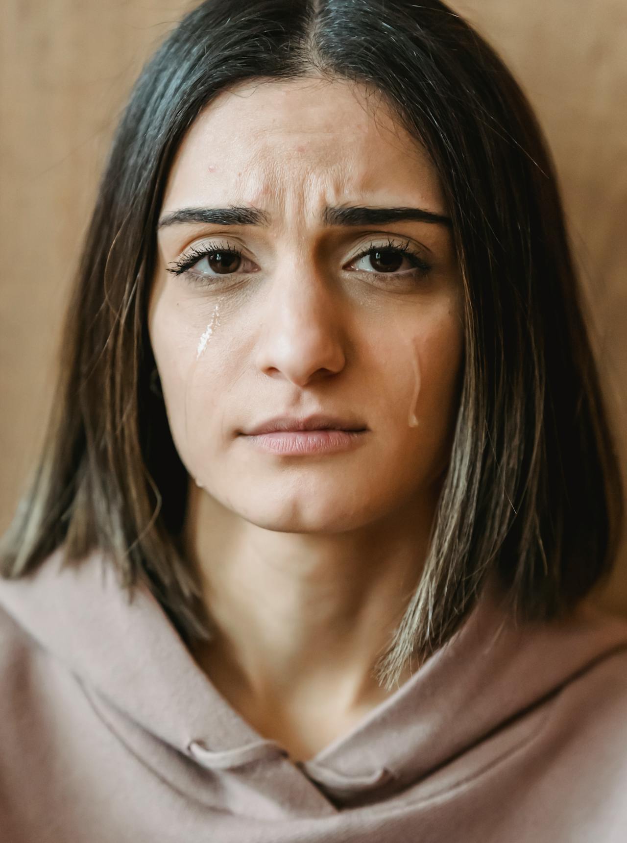 Una mujer con los ojos llorosos | Fuente: Pexels