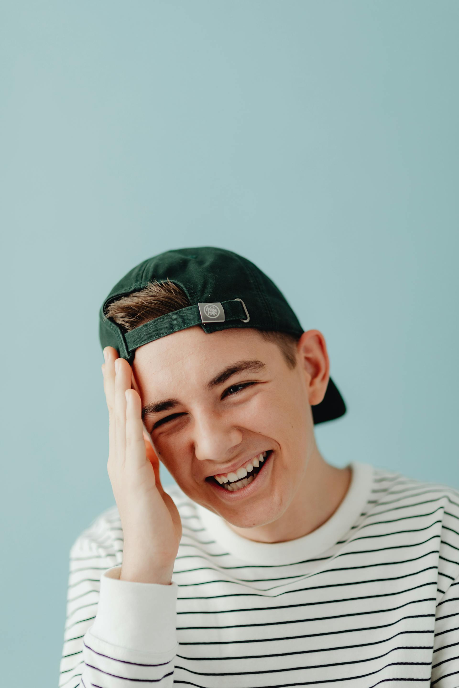 Un niño riendo | Fuente: Pexels