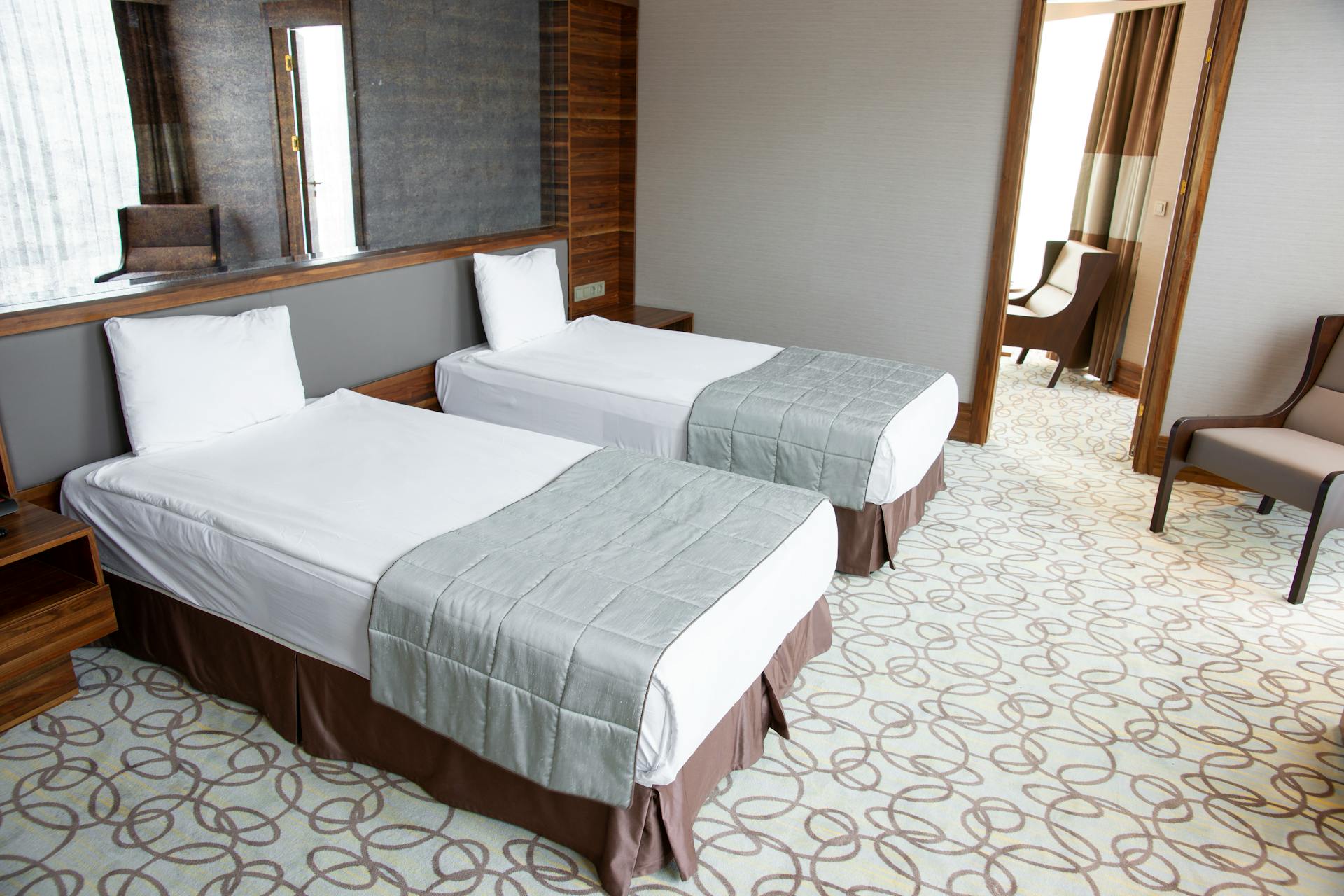 Camas en una habitación de hotel | Fuente: Pexels