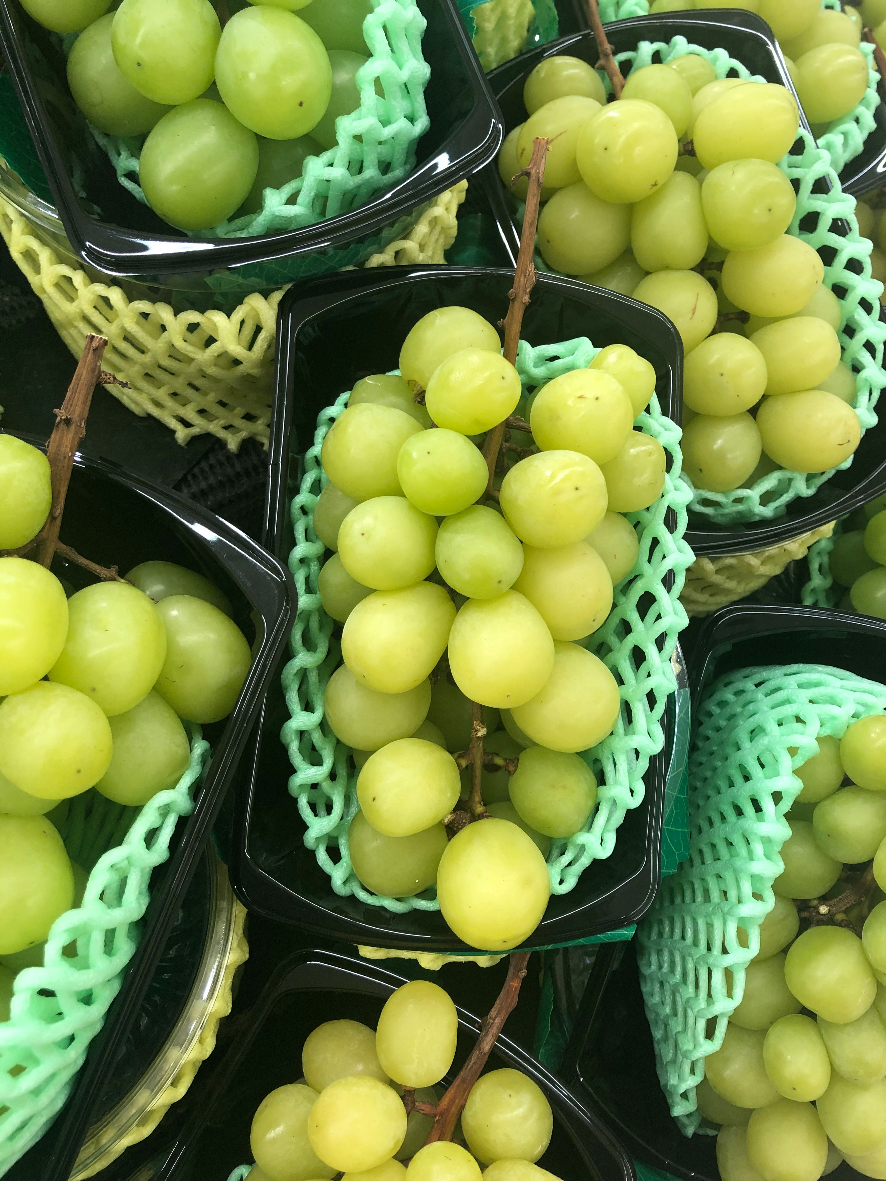 Cestas de uvas verdes | Fuente: Unsplash