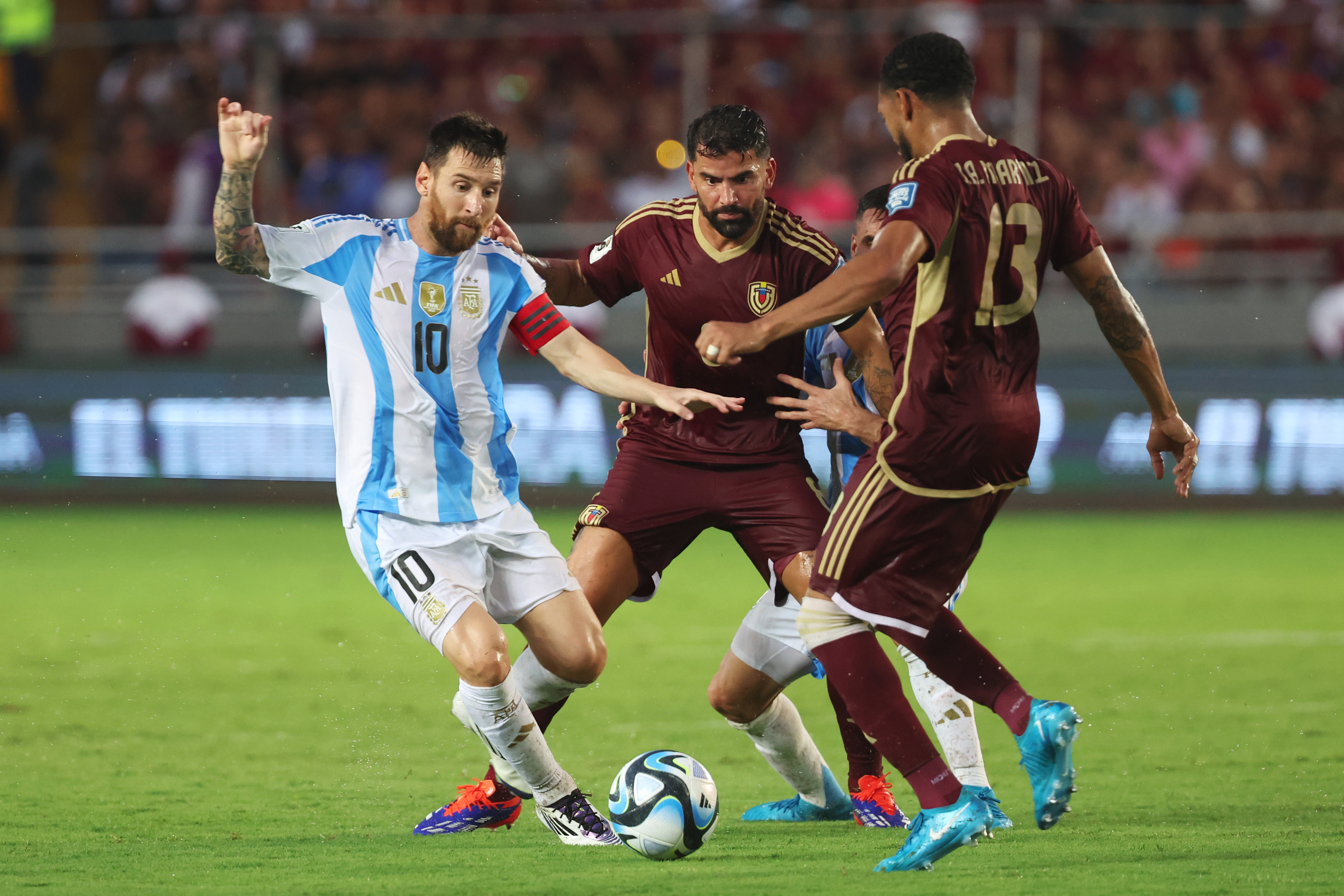 Lionel Messi of Argentina and Tomas Rincon of Venezuela battle for the ball during the FIFA World Cup 2026 South American Qualifier match between Venezuela and Argentina at Estadio Monumental de Maturin on October 10, 2024 in Maturin, Venezuela.