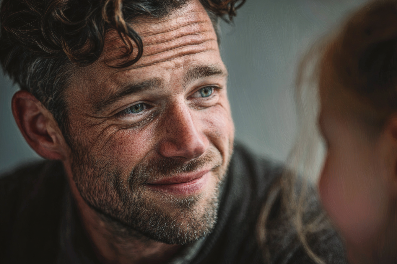 Un hombre hablando con una niña | Fuente: Midjourney
