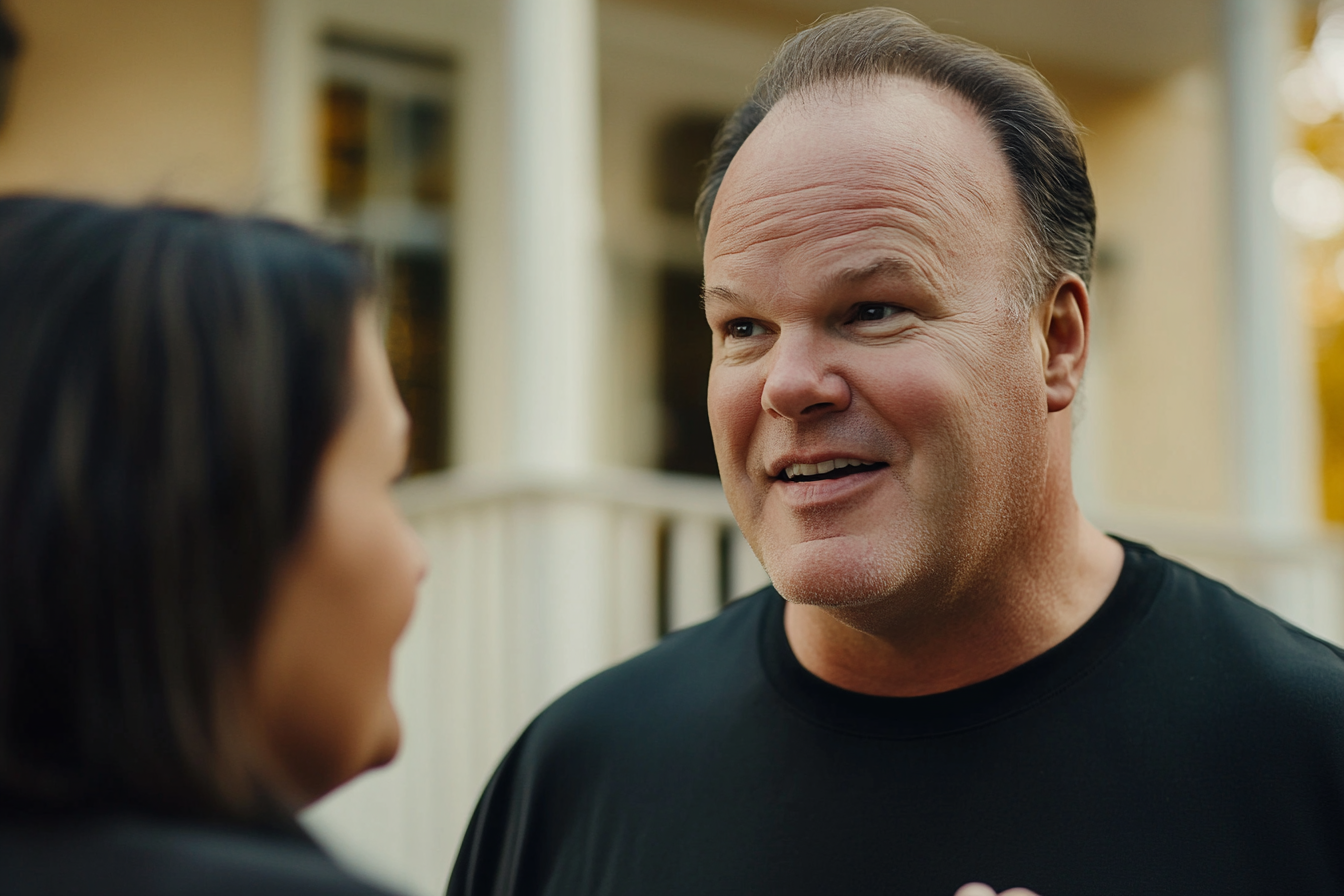 Un hombre hablando con su esposa | Fuente: Midjourney