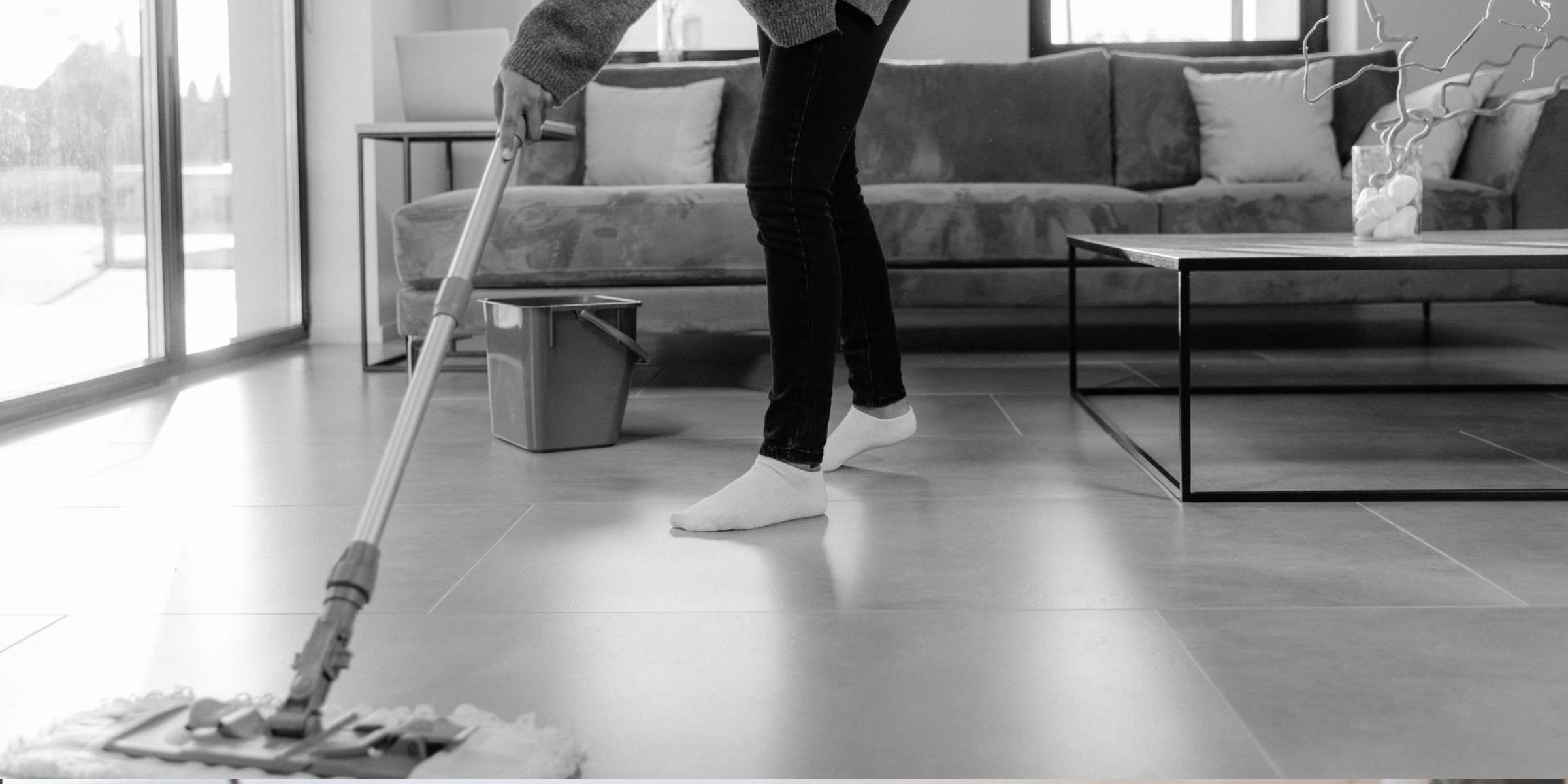 Close-up shot of a person mopping the floor | Source: Pexels