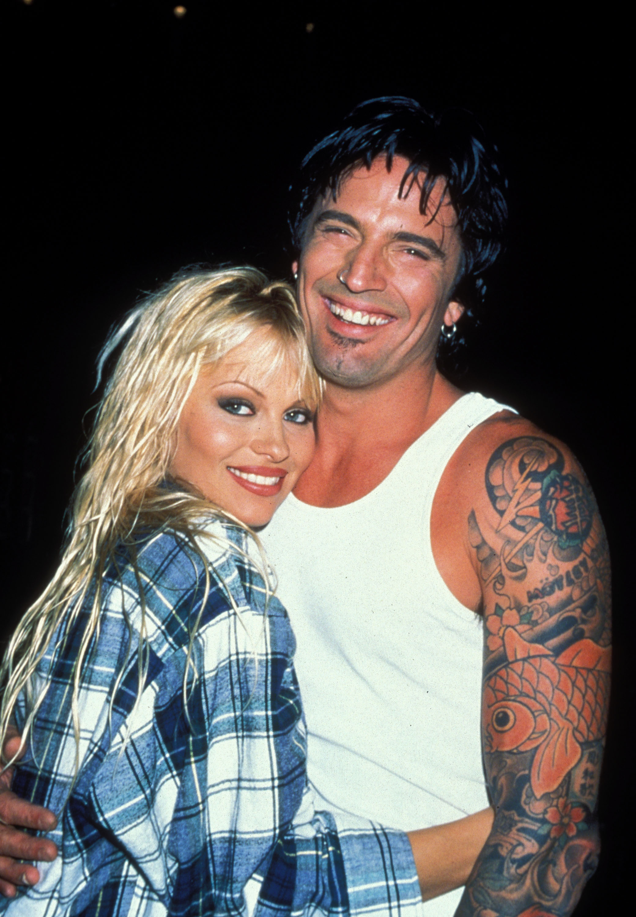Pamela Anderson y Tommy Lee en el Planet Boom de North Hollywood, California, el 13 de abril de 1996 | Fuente: Getty Images