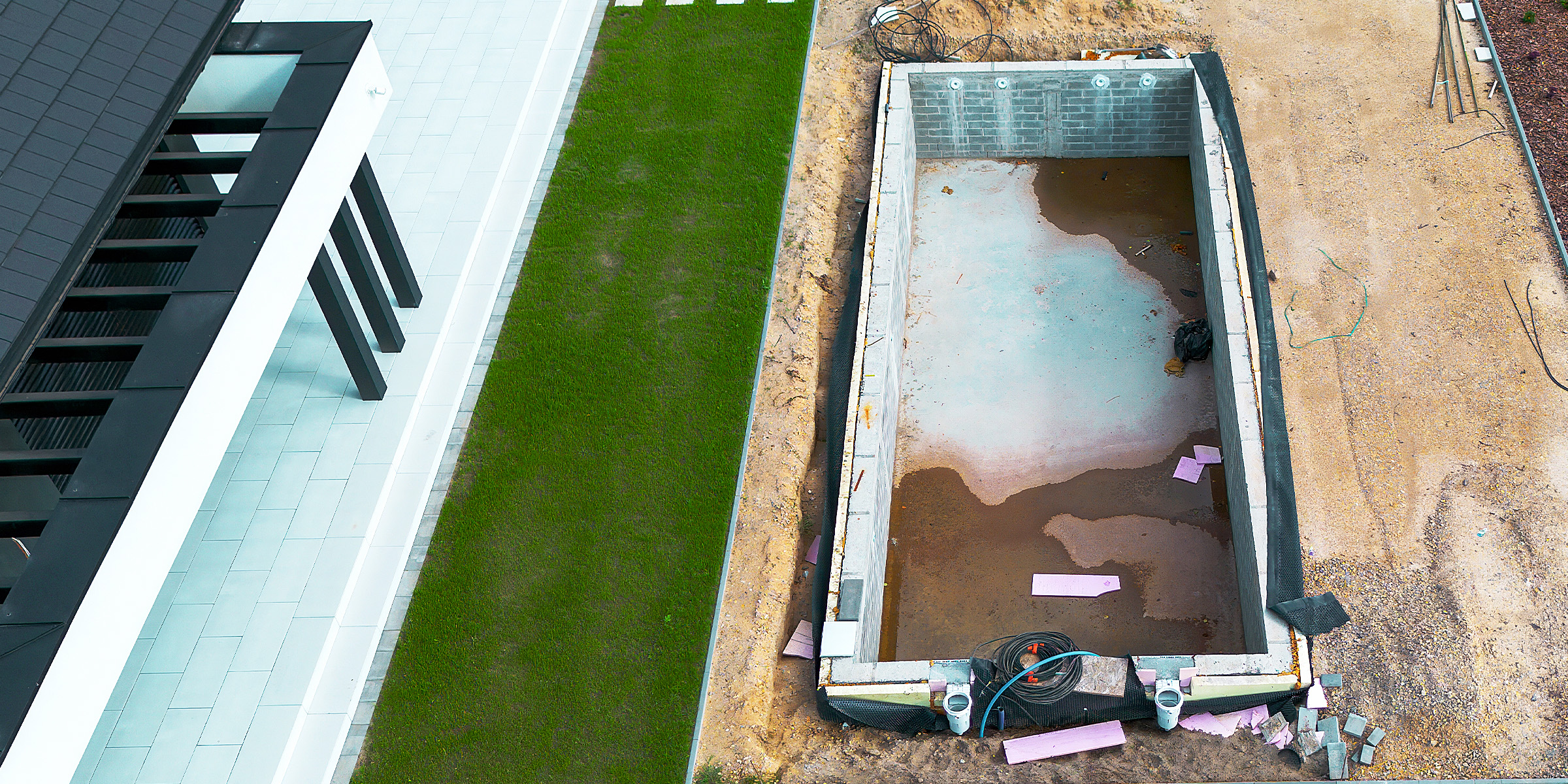 Vista aérea de una obra de construcción de una piscina | Fuente: Shutterstock