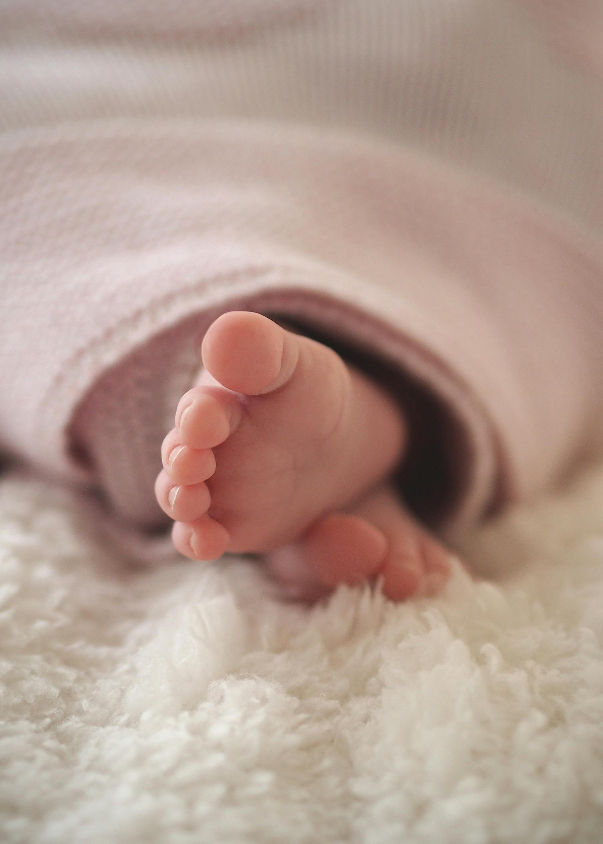 Los pies de un bebé | Fuente: Pexels