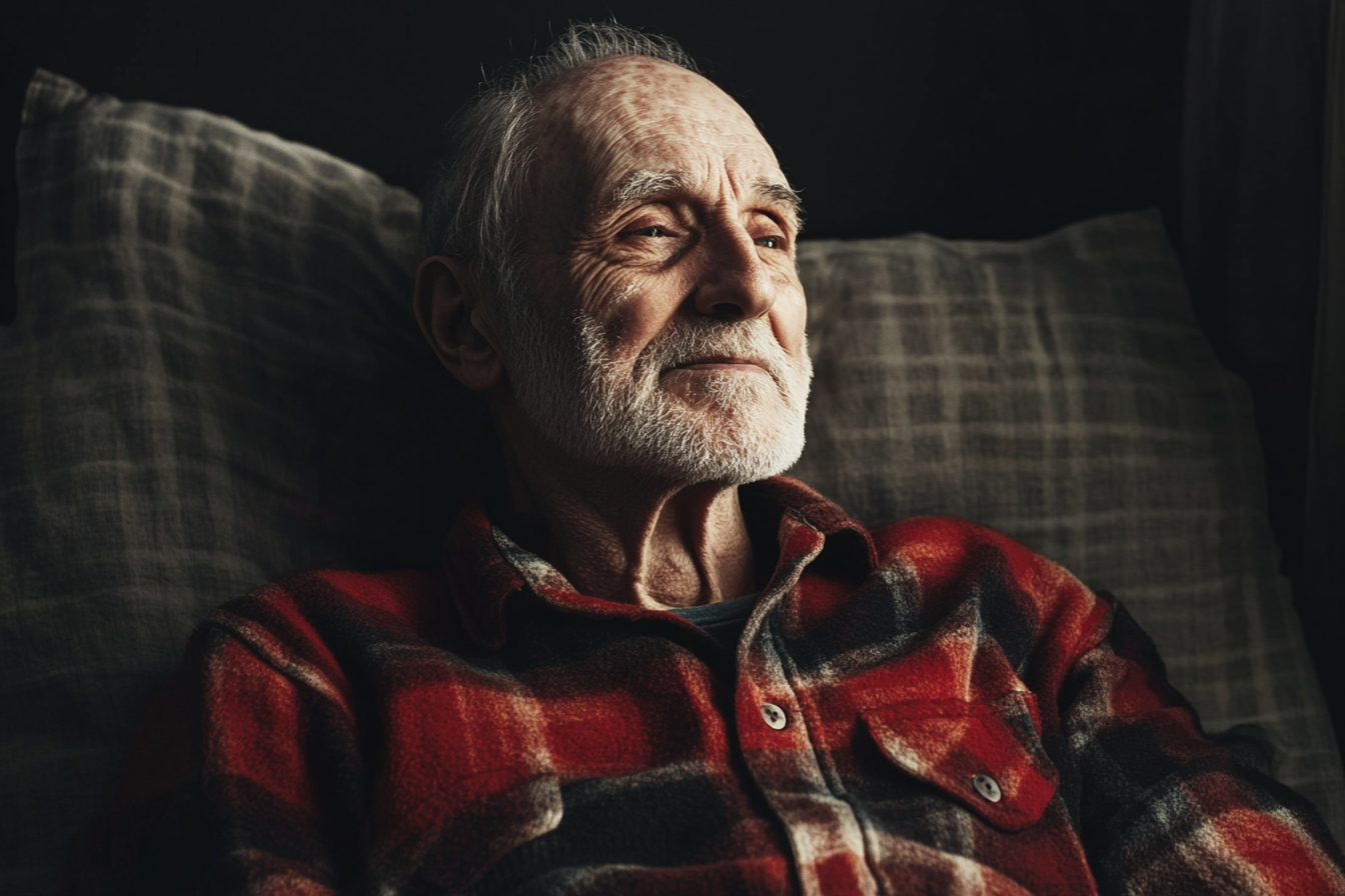 Un hombre postrado en cama sonriendo a alguien | Fuente: Midjourney