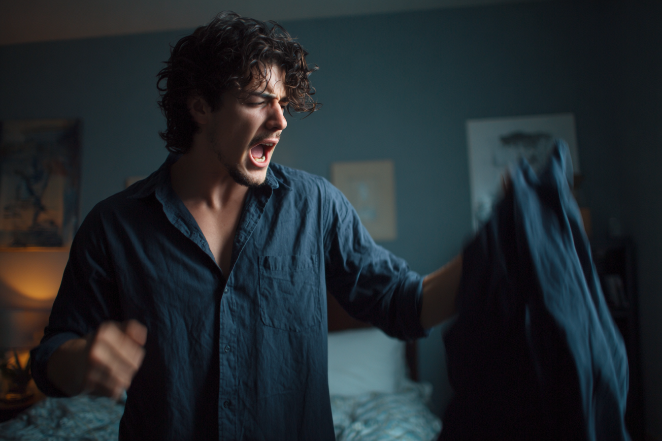 Un hombre enfadado agarrando una camisa | Fuente: Midjourney