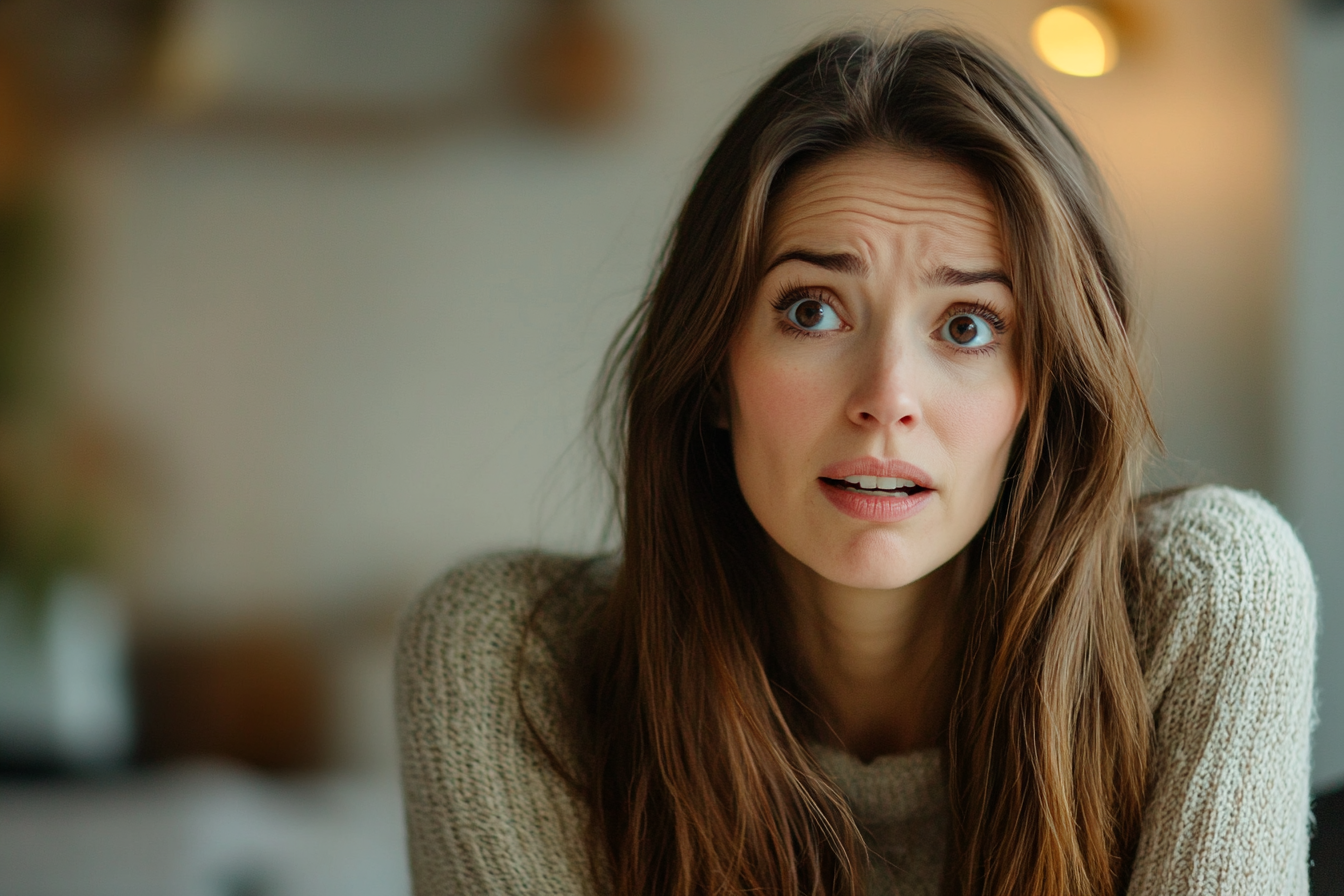 Una mujer conmocionada | Fuente: Midjourney