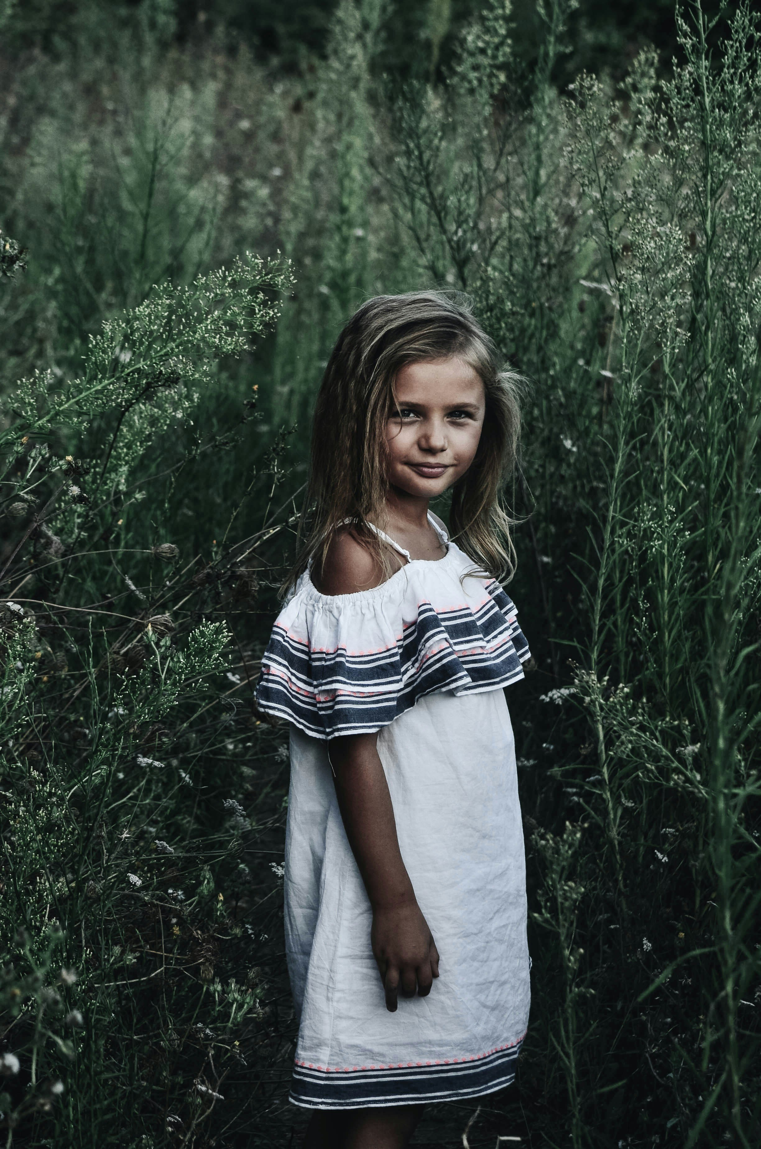 Una niña sonriente | Fuente: Unsplash