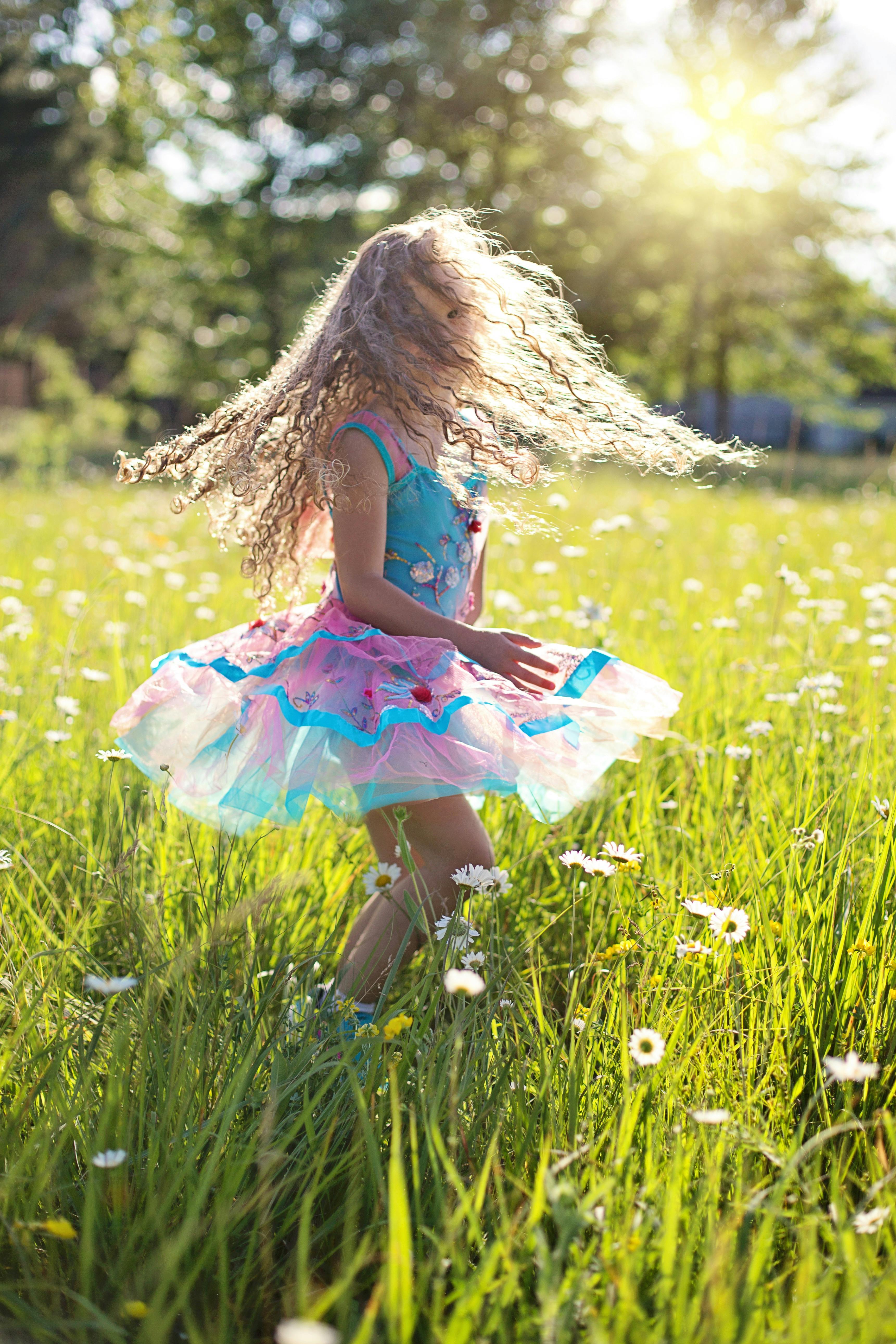 Una niña feliz | Fuente: Pexels