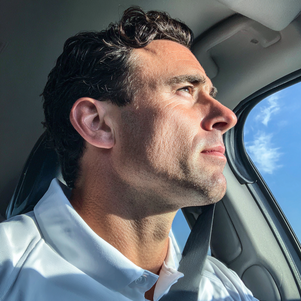 Un hombre conduciendo un automóvil | Fuente: Midjourney