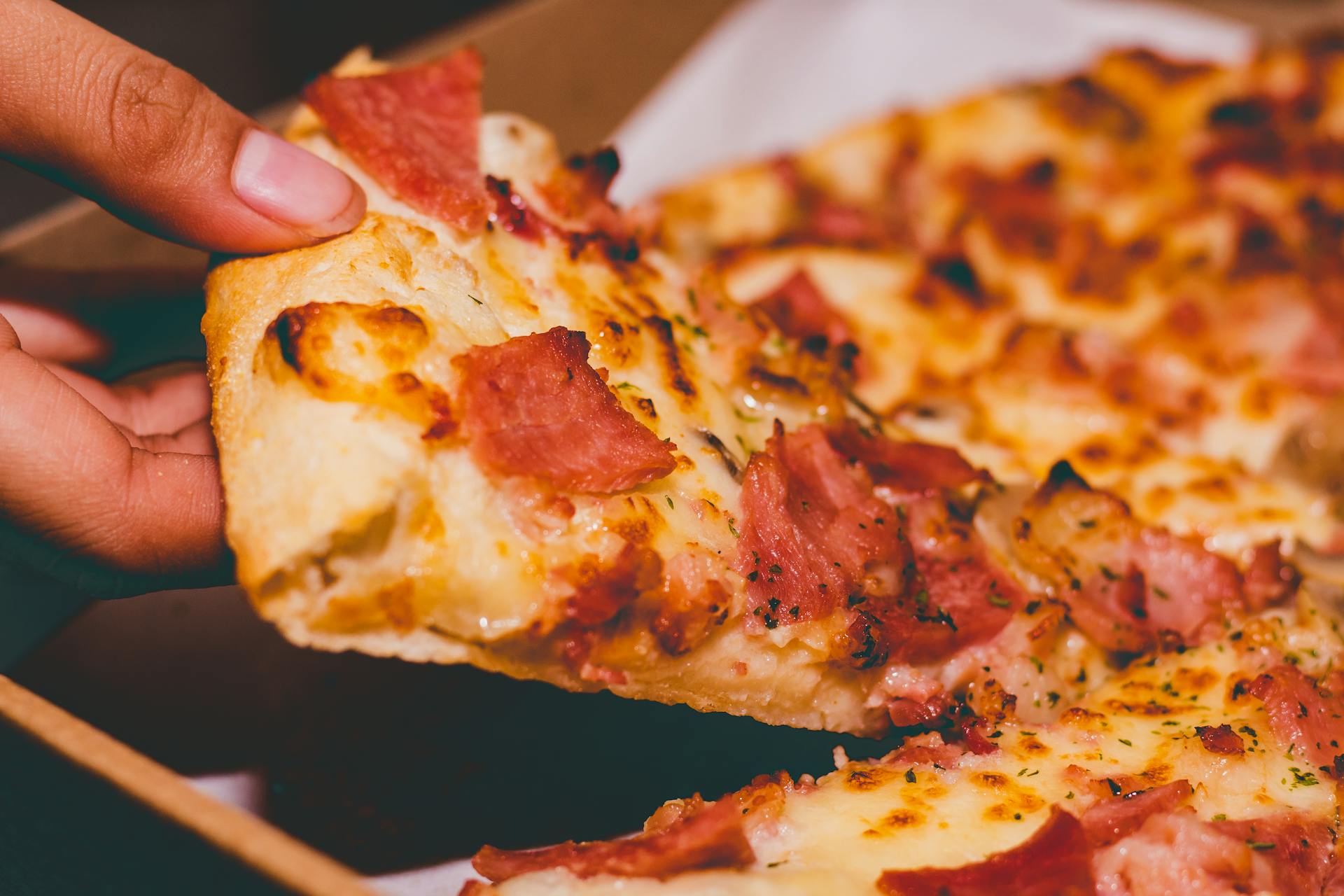 Un trozo de pizza | Fuente: Pexels